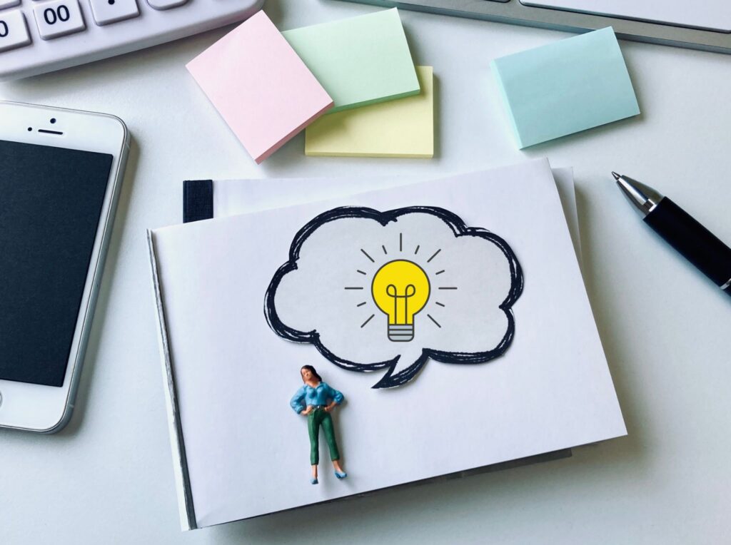 投資のアイデアやヒントをひらめいたイメージ